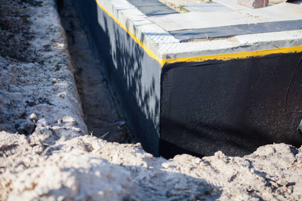 Professional Basement Waterproofing technician working in Terre Haute, IN